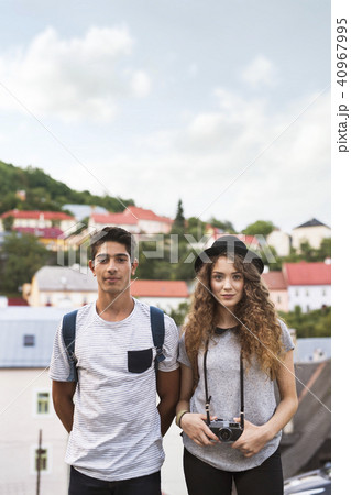 Two young tourists with camera in the old town. 40967995