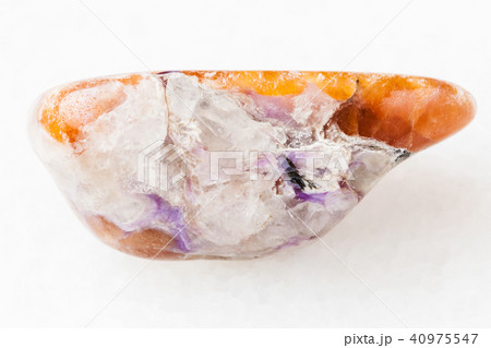 charoite in tumbled Tinaksite gemstone on white charoite in tumbled Tinaksite gemstone on white 40975547