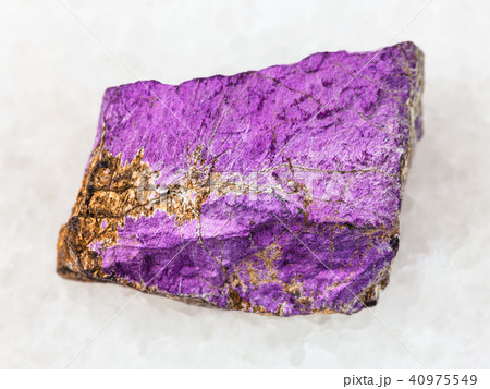 rough Purpurite stone on white rough Purpurite stone on white 40975549