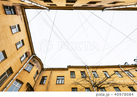 electrical wires and cables over urban courtyard 40978084