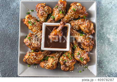 Chicken teriyaki wings with barbecue sauce 40978287