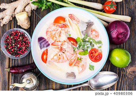 Delicious hot Thai soup Tom Yam with coconut milk and shrimps 40980306
