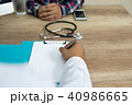 Hands of doctors are writing prescriptions  40986665