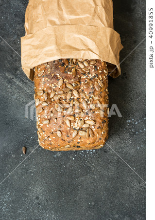 Homemade fresh rye bread with sunflower seeds. Homemade fresh rye bread with sunflower seeds. 40991855