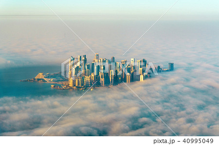 Aerial view of Doha through the morning fog - Qatar, the Persian Gulf Aerial view of Doha through the morning fog - Qatar, the Persian Gulf 40995049