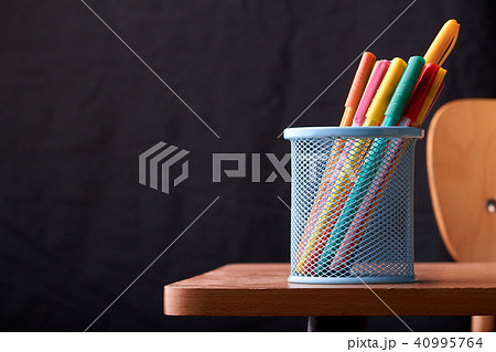 Color Magic in a metal box on a black background. Color Magic in a metal box on a black background. 40995764