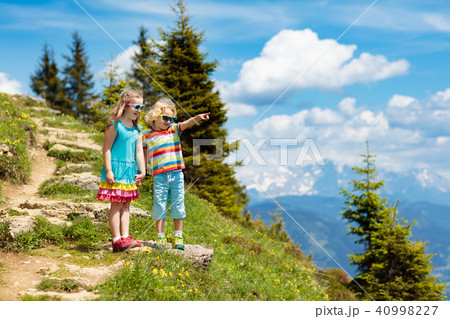 Children hiking in Alps mountains. Kids outdoor. 40998227