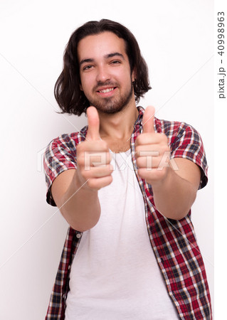 Young handsome guy posing casually isolated on white Young handsome guy posing casually isolated on white 40998963