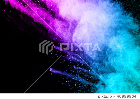 Abstract multi color powder explosion on black 40999904