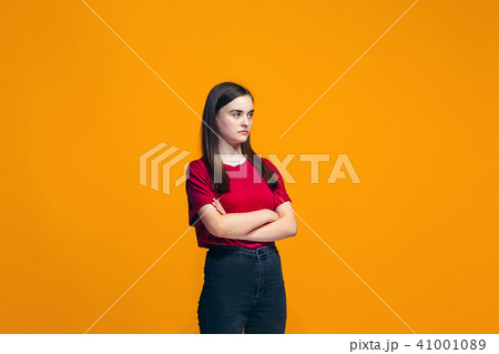 Young serious thoughtful teen girl. Doubt concept. Young serious thoughtful teen girl. Doubt concept. 41001089