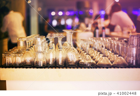 Empty glasses on bar counter 41002448