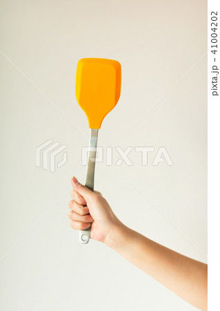 Isolated image of hand hold flipper for frying pan Isolated image of hand hold flipper for frying pan 41004202