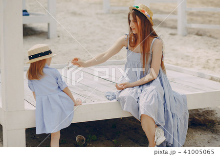 Mother with daughters 41005065