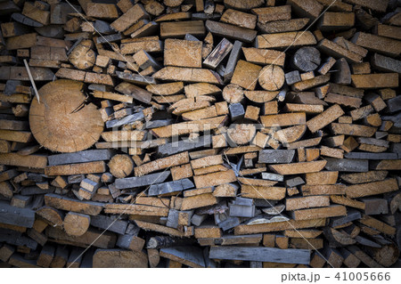 Firewood background. Pile of chopped fire wood. Firewood background. Pile of chopped fire wood. 41005666