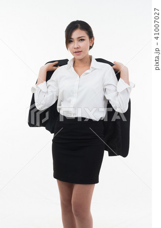 Business woman posing on whiteboard on white  41007027