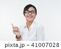 Business woman posing on whiteboard on white  41007028