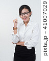 Business woman posing on whiteboard on white  41007029