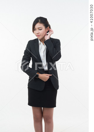 Business woman posing on whiteboard on white 41007030