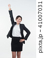 Business woman posing on whiteboard on white  41007031