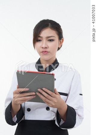portrait of asia clef woman with tablet on white  41007033