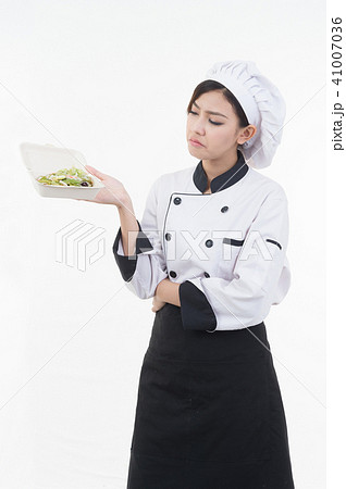 portrait of asia clef woman with food on white 41007036