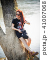 asia attractive young woman with sunglasses 41007068
