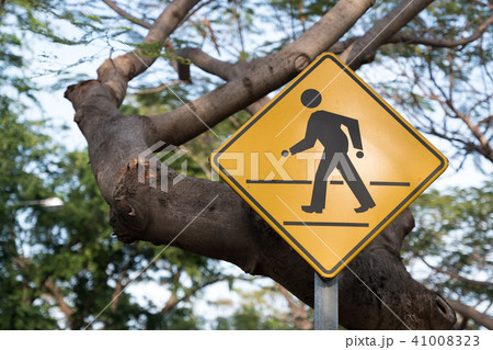 Pedestrian crossing in public  41008323