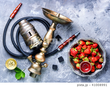 Stylish oriental shisha with strawberry Stylish oriental shisha with strawberry 41008991