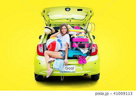 Ready to travel. Woman in Car before Travel 41009113