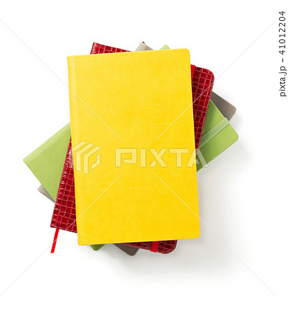 colorful notebook at white background colorful notebook at white background 41012204