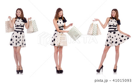 Young woman with shopping bags on white 41015093