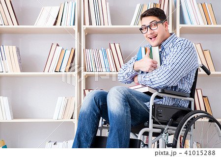 Disabled student studying in the library 41015288