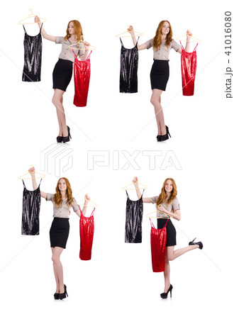 Woman choosing the dress isolated on white 41016080