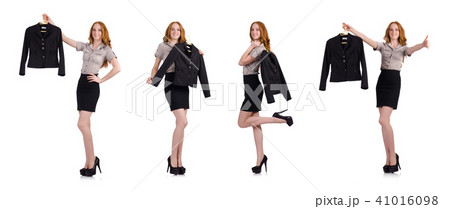 Woman choosing the dress isolated on white 41016098