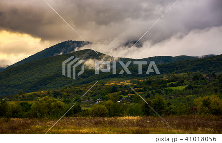 rising clouds in mountainous countryside 41018056