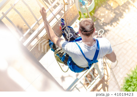 Industrial climber at work Industrial climber at work 41019423