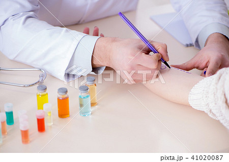 Doctor testing allergy reaction of patient in hospital Doctor testing allergy reaction of patient in hospital 41020087