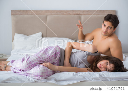 Woman and man in the bedroom 41021791
