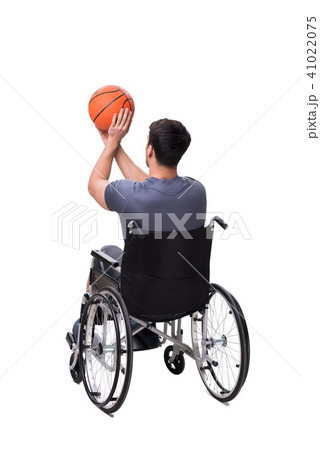 Basketball player recovering from injury on wheelchair Basketball player recovering from injury on wheelchair 41022075
