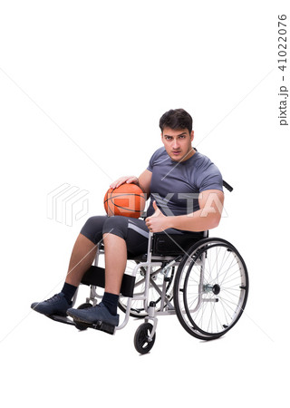 Basketball player recovering from injury on wheelchair Basketball player recovering from injury on wheelchair 41022076