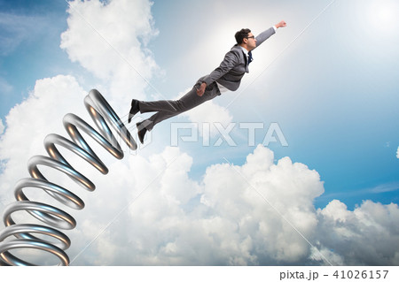 Businessman jumping from spring in promotion concept 41026157