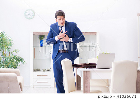Bankrupt businessman angry and upset at home Bankrupt businessman angry and upset at home 41026671
