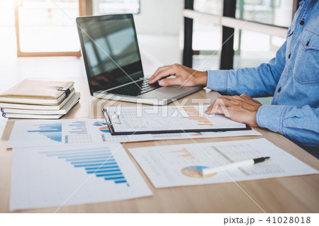 Businessman working analysis finance with calculate about cost o Businessman working analysis finance with calculate about cost o 41028018