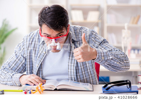 Medical student sitting at the lecture in university Medical student sitting at the lecture in university 41028666
