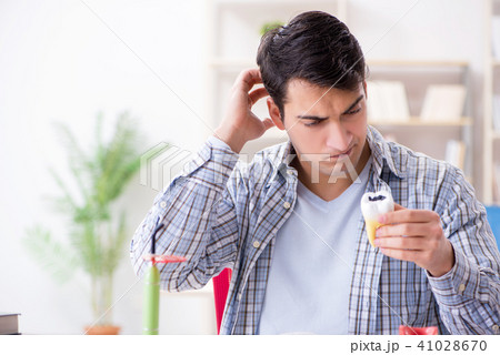 Medical student learning dentistry in classroom 41028670