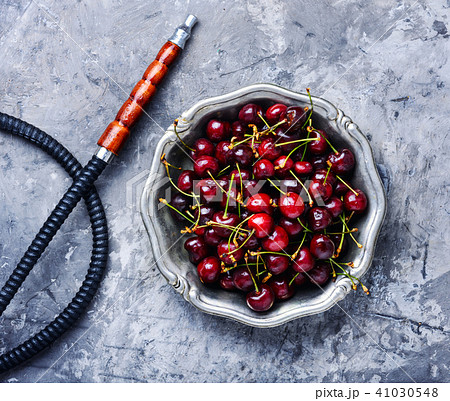 Stylish oriental shisha with cherries 41030548