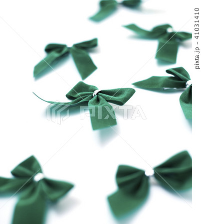 Green velvet bows on white Green velvet bows on white 41031410