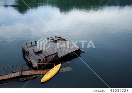 Fantastic lake with ship in Thailand national park Fantastic lake with ship in Thailand national park 41036228
