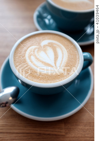 Two cups of coffee on the table Two cups of coffee on the table 41039464