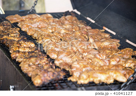 Spicy Grilled Jerk Chicken on the barbecue Spicy Grilled Jerk Chicken on the barbecue 41041127